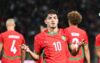 Brahim Díaz wearing Morocco’s national team jersey, celebrating after a match — a rising star for both Real Madrid and the Atlas Lions.