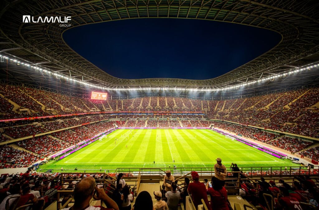 Interior view of the Prince Moulay Abdellah Stadium in Rabat during a night match, illuminated by Lamalif Group’s advanced lighting system