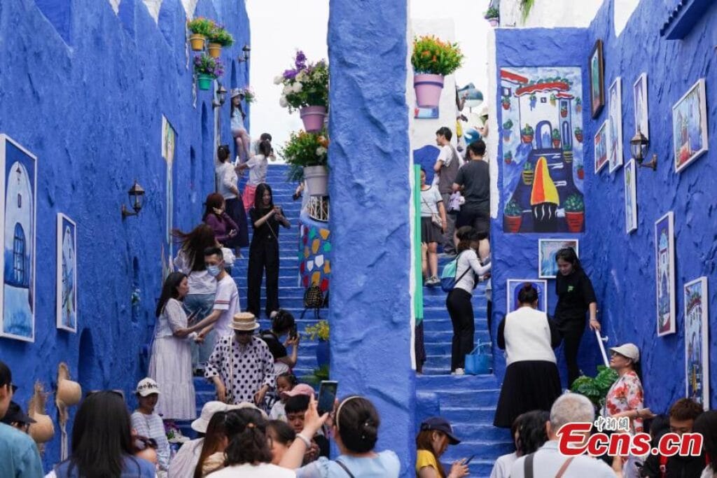 Tourists visit a replica of Morocco’s “blue city” Chefchaouen at Harbin Polarland in Harbin, northeast China’s Heilongjiang Province,
Photo Credit: China News Service/Zhao Yuhang / China news.com