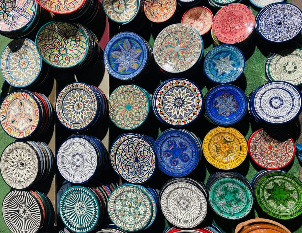Piles of Handmade Plates with Oriental Patterns ·