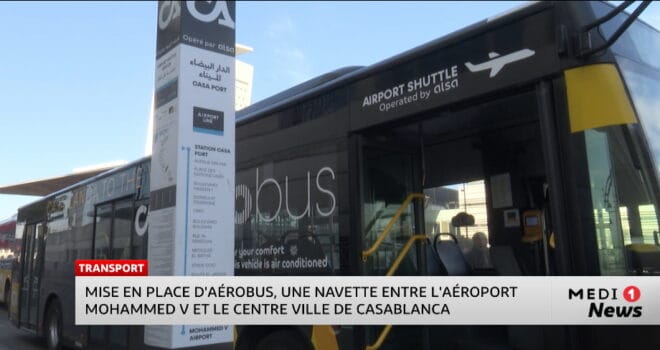 Aérobus shuttle operated by Alsa connecting Mohammed V Airport to downtown Casablanca, shown at a station with the route map displayed.