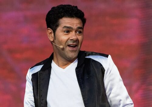 Jamel Debbouze attending a public event, later reacting to Morocco’s AFCON 2025 opening night and sharing his pride on Instagram.