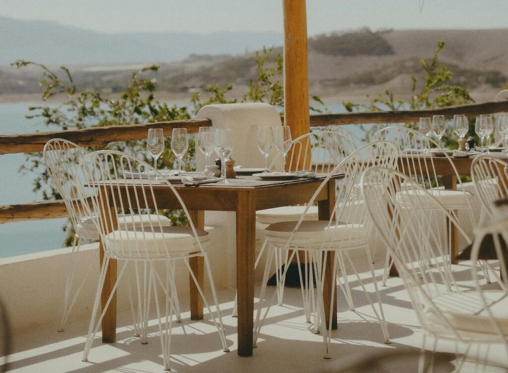 Lakeside restaurant terrace at Lalla Takerkoust Lake near Marrakech with mountain and reservoir views