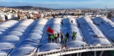Grand Stade de Tanger Completes Roof Covering as Workers Raise Moroccan Flag for Green March Anniversary